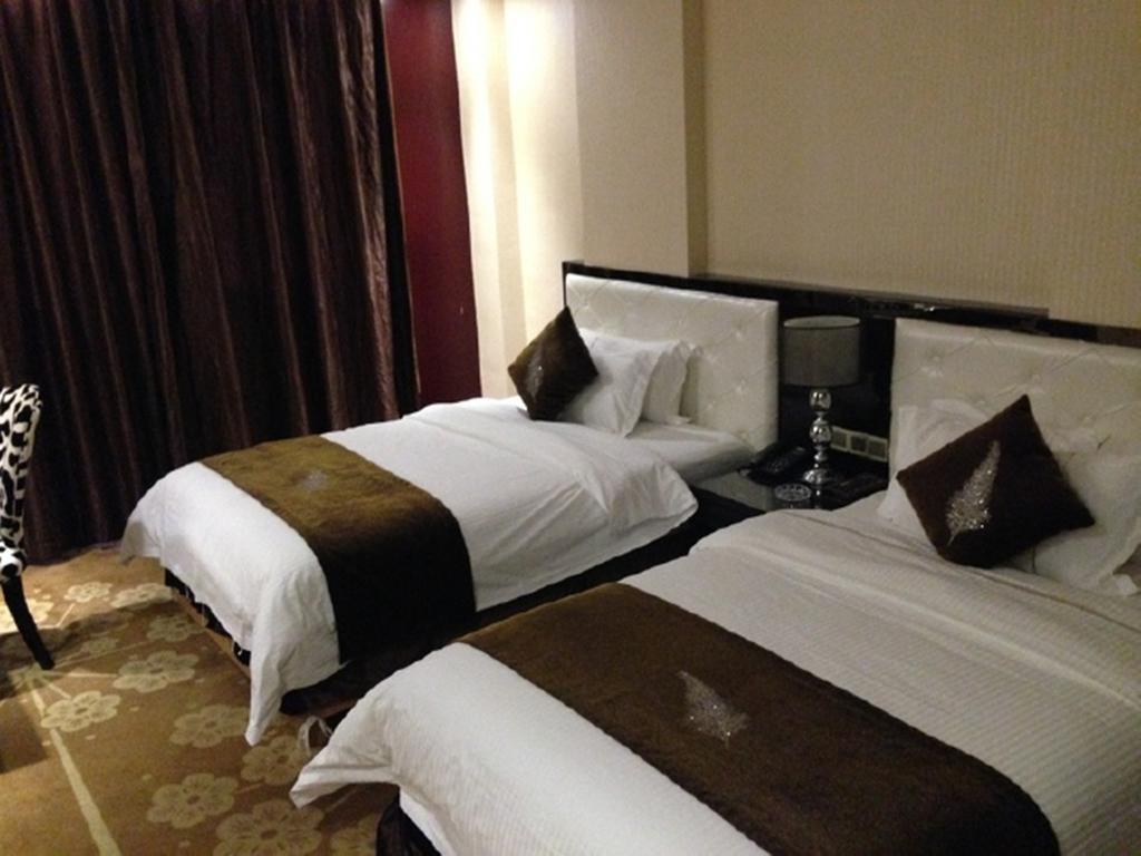 Tianguo Times Hotel 포산 시 객실 사진