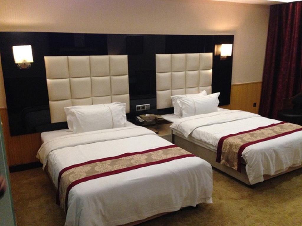 Tianguo Times Hotel 포산 시 객실 사진
