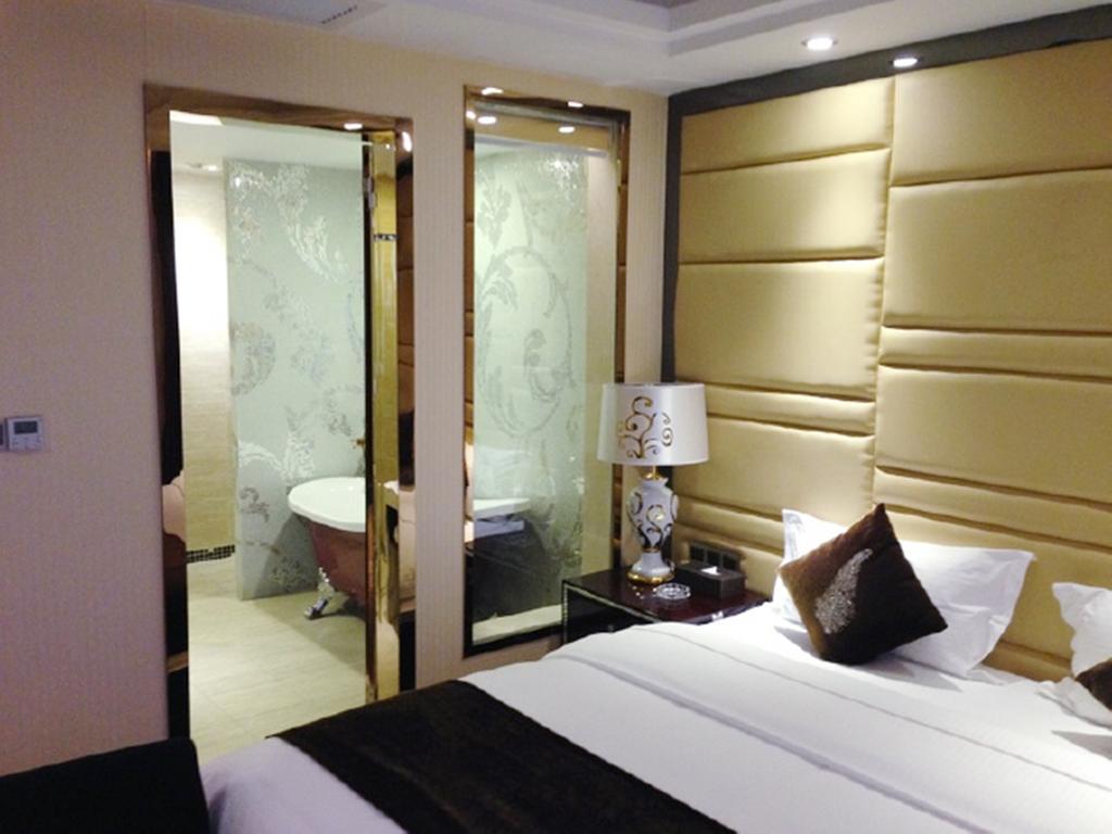 Tianguo Times Hotel 포산 시 객실 사진